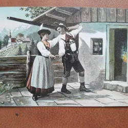 Carte postala, barbat si femeie in costume traditionale, inceput de secol XX