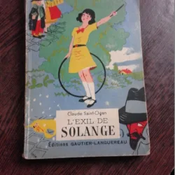 L'EXIL DE SOLANGE - CLAUDE SAINT-OGAN  (CARTE IN LIMBA FRANCEZA)