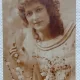 Carte postala, Tanara cu flori de primavara, 1929