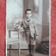 Fotografie tip carte postala, baietel cu carti, perioada interbelica